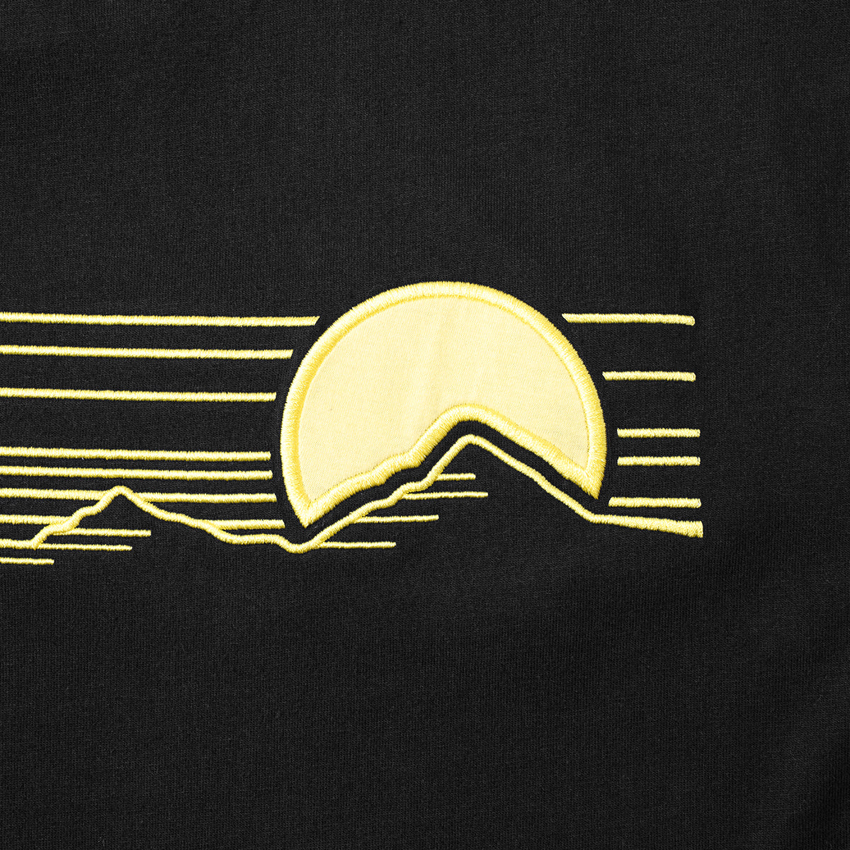 Close up image of Turbo Threads Black Box Fit Tee with yellow sunset Days Of Thunder inspired graphic.  