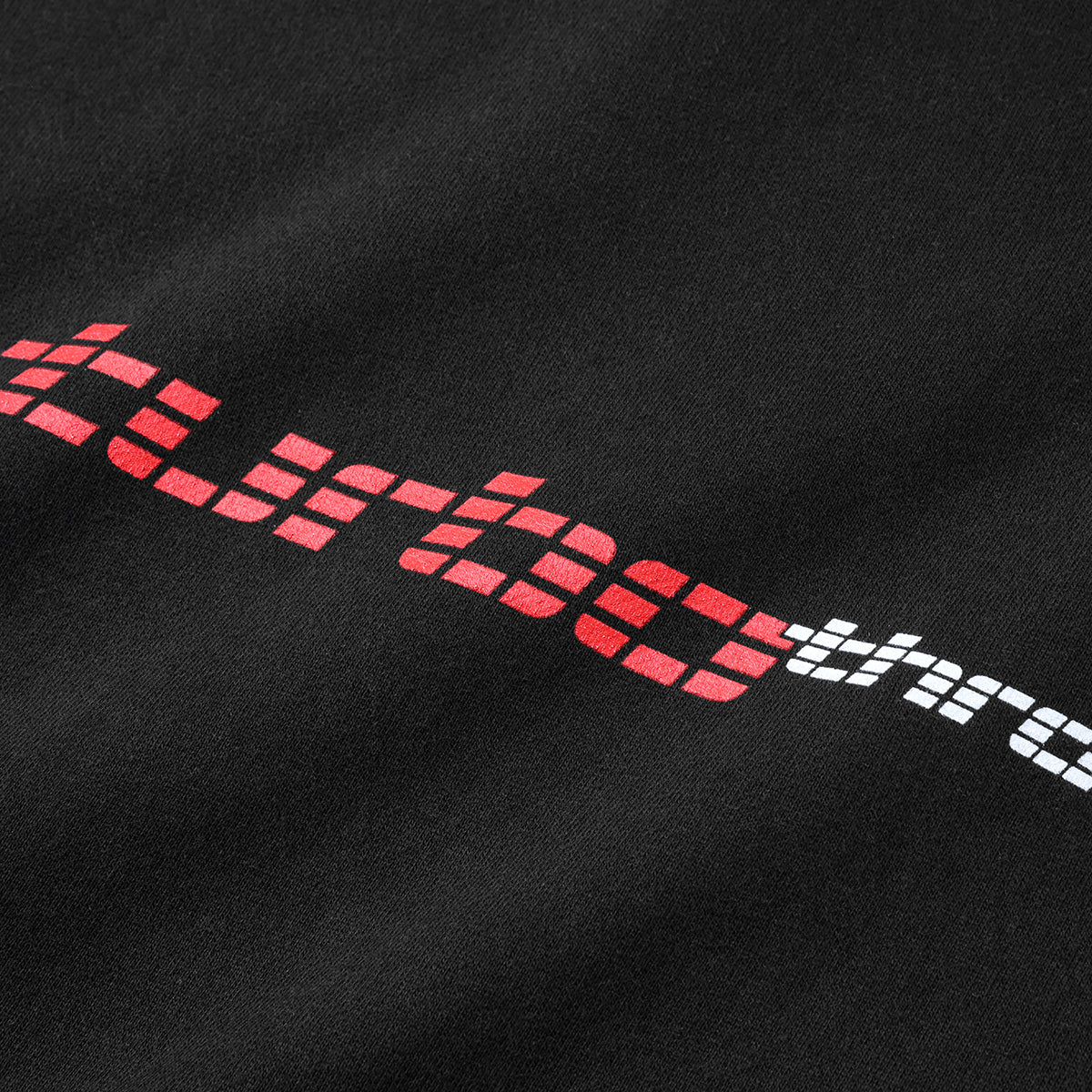 Close up of Turbo Threads Black Box Fit Hoodie with red and white turbo threads logo