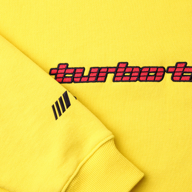 Close up of Turbo Threads Yellow Box Fit Hoodie with red turbo threads logo